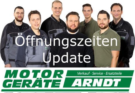 Ein Bild der Mitarbeiter mit dem Firmenlogo